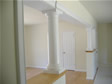 Columns and half walls add interest and focal points as well as separate interior space very well